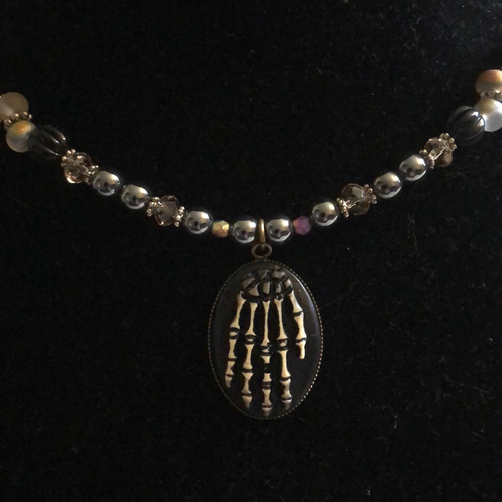 Hand crafted skeleton hand hematite Czech glass necklace - Picture 2 of 6